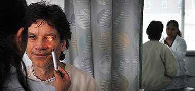 Doctor conducting eye exam